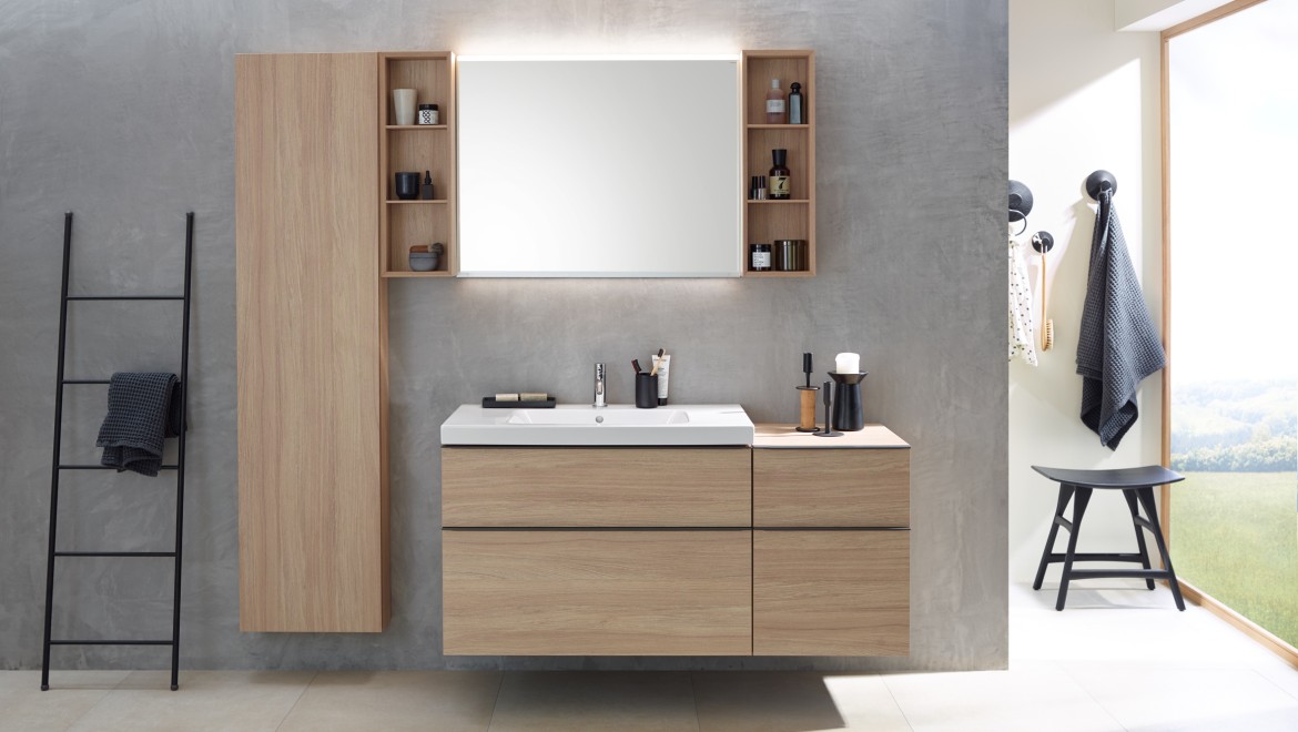 Espace lavabo aménagé avec des meubles de la série Geberit iCon